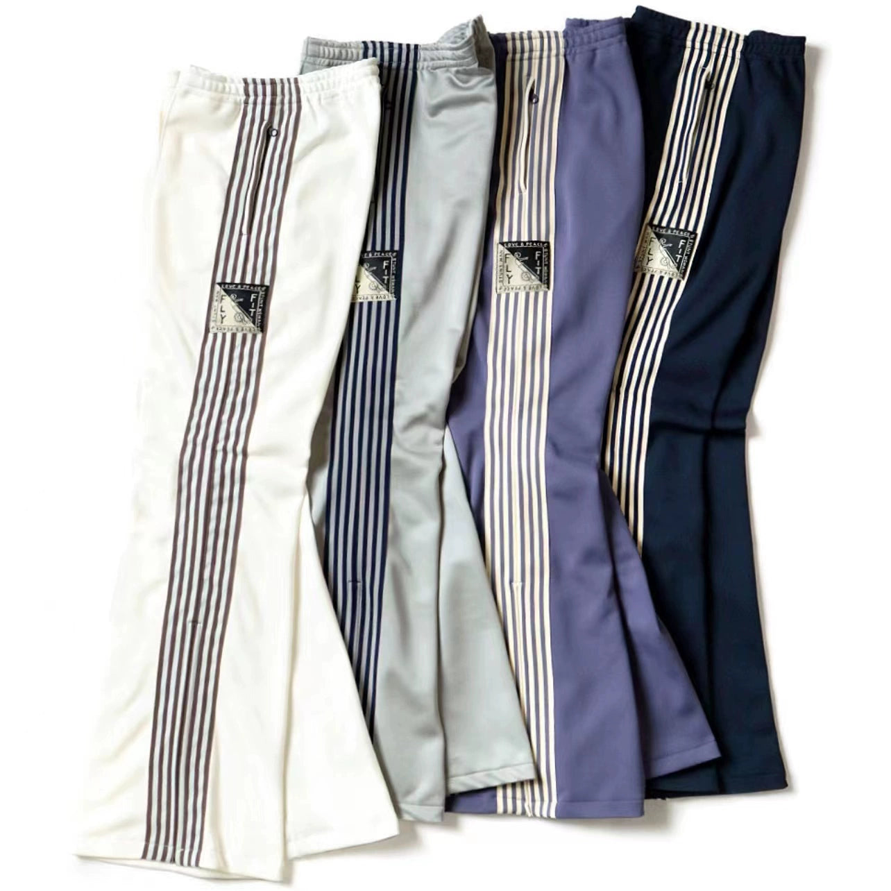 Japanese three-color polyester side zipper vertical stripe elastic casual trousers